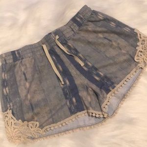 Denim wash lace shorts